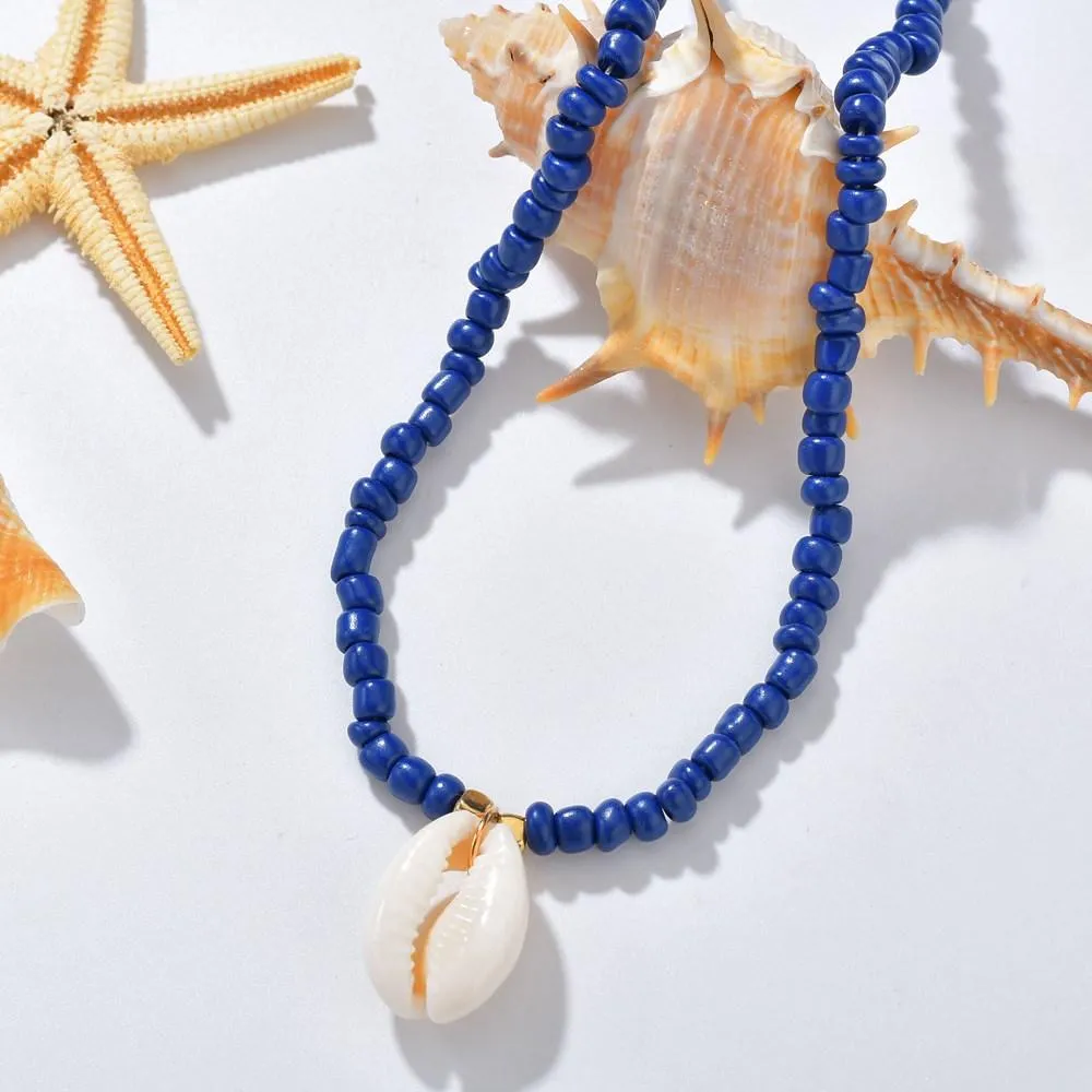 Blue and White Beaded Necklace with Puka Shell Pendant