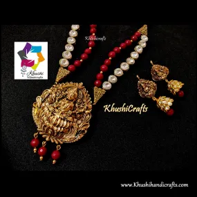 Deep Red shaded Semi precious Jewelry Set with a grand Temple Jewellery Lakshmi Pendant in Antique Gold!